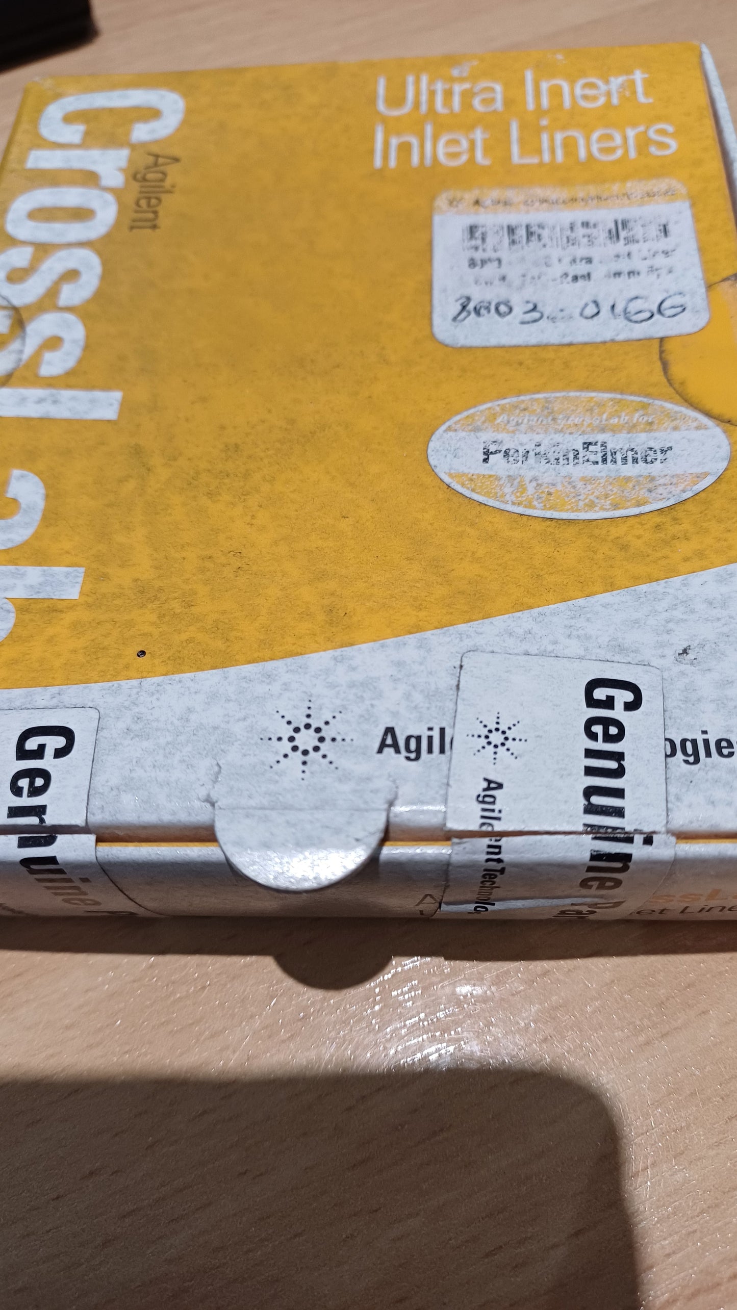 8003-0166 Agilent liner for PerkinElmer, Ultra Inert, 4 mm id, split, straight, restriction, 5/pk. Compatible with Perkin Elmer Auto SYS and Clarus 580/680 GCs.